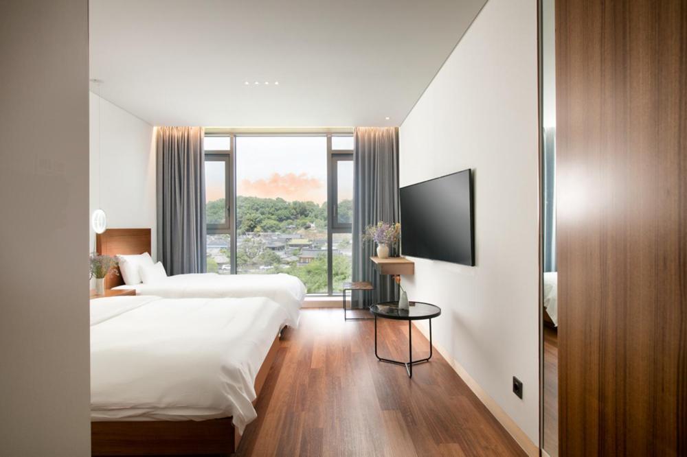 Daon Hotel Čondžu Pokoj fotografie