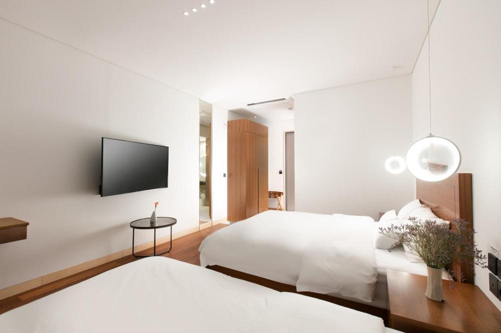 Daon Hotel Čondžu Pokoj fotografie