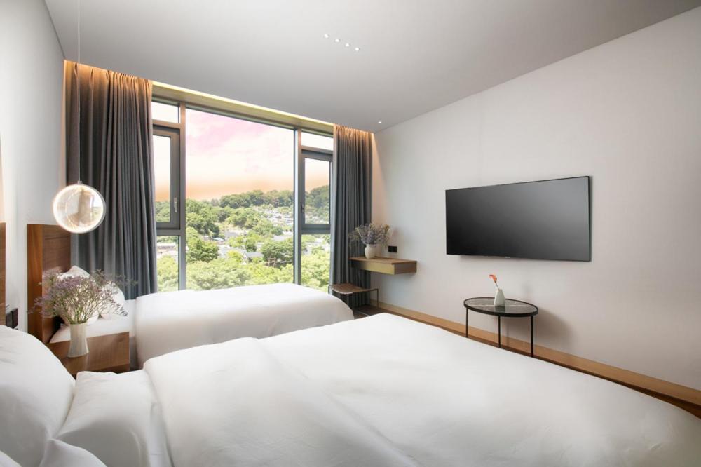 Daon Hotel Čondžu Pokoj fotografie